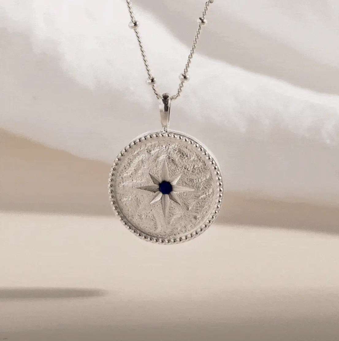 CLAIRE HILL DESIGNS "BRAVE" SHORTHAND COIN NECKLACE