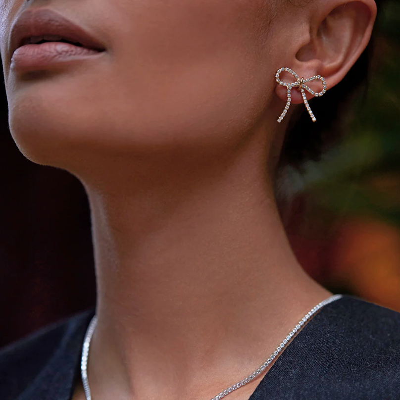 ESTELLA BARTLETT BOW TENNIS CHAIN EARRINGS