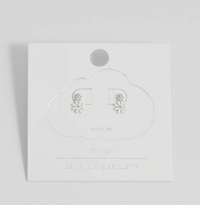 ESTELLA BARTLETT WHITE ENAMEL DOUBLE FLOWER EARRINGS