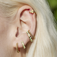 SCREAM PRETTY LARGE TWIST HUGGIE EARRINGS