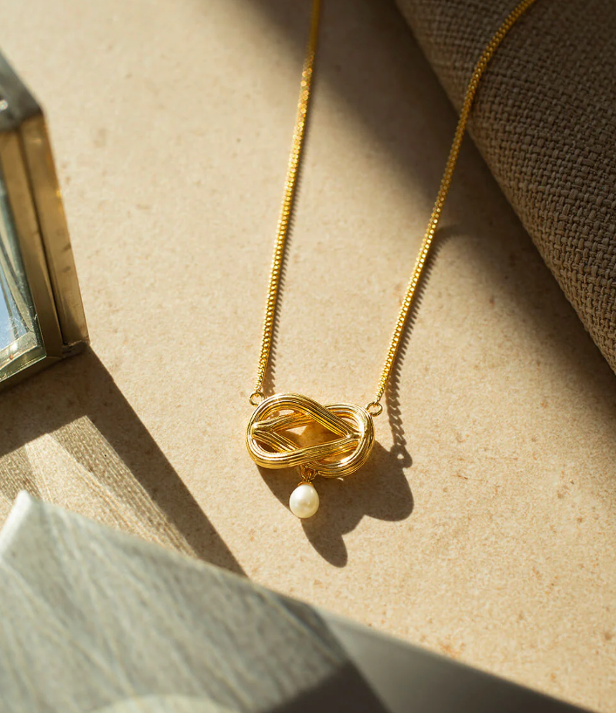 CLAUDIA BRADBY LOVE KNOT PEARL NECKLACE