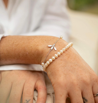 CLAUDIA BRADBY BUTTON PEARL BRACELET