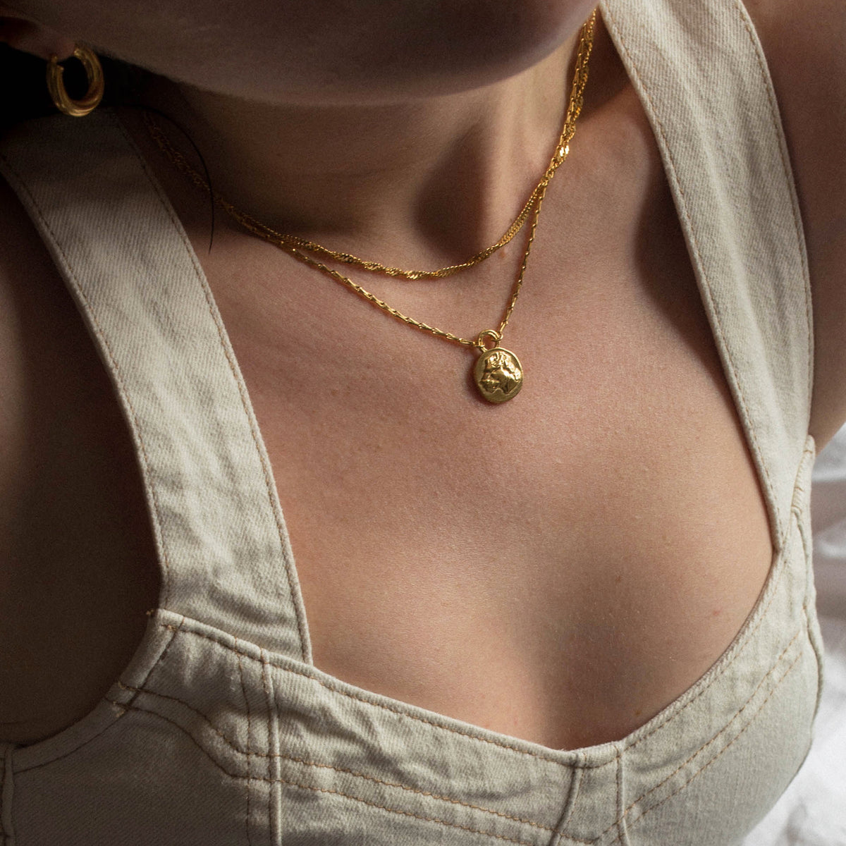 MIKAELA LYONS REVERSIBLE LIONESS COIN PENDANT