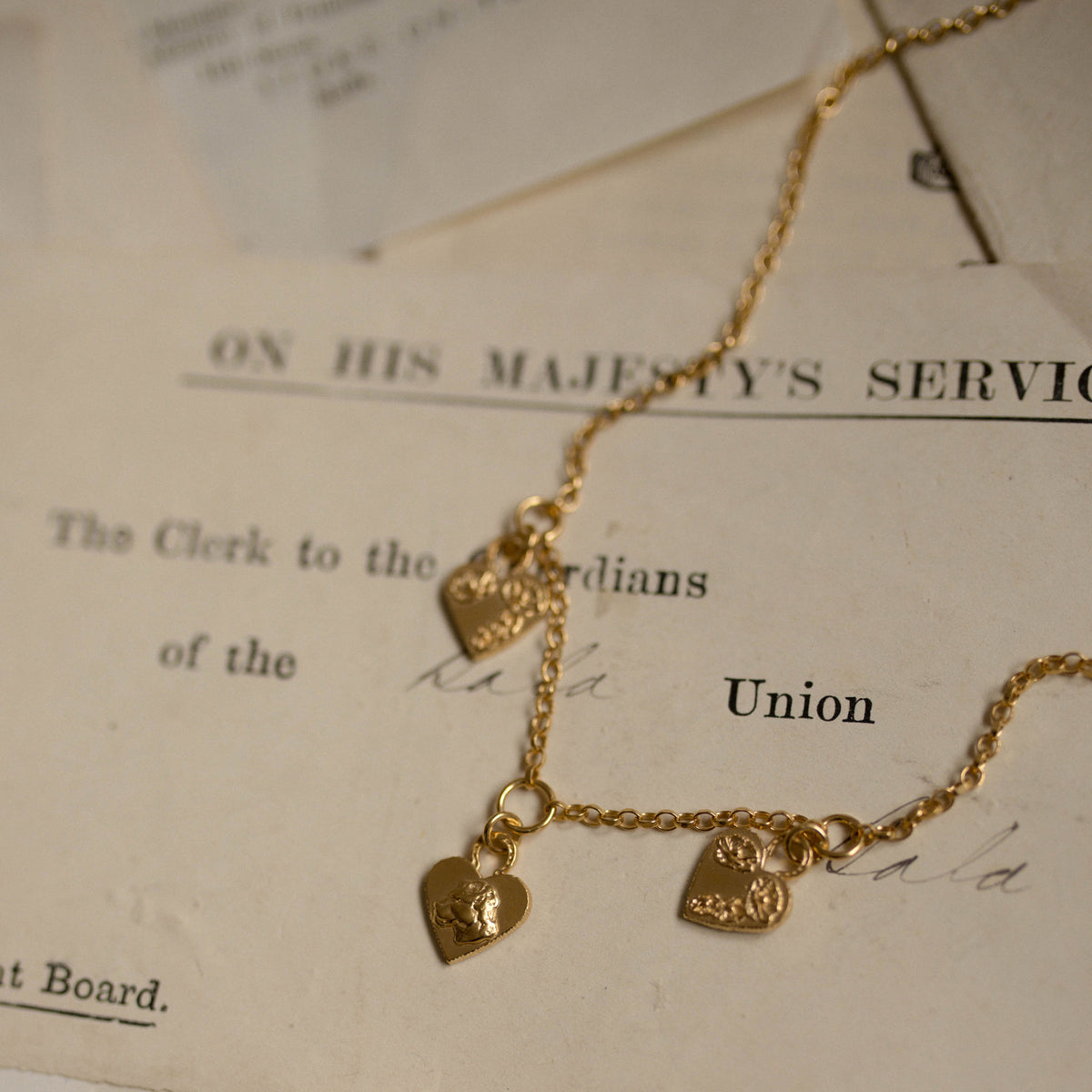 MIKAELA LYONS MULTI HEART PENDANT