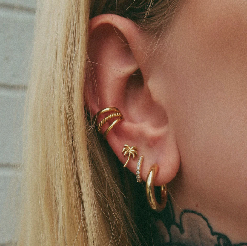 SCREAM PRETTY HUGGIE EARRINGS WITH CLEAR STONES