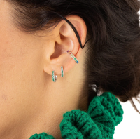 SCREAM PRETTY HUGGIE EARRINGS WITH GREEN STONES