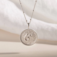 CLAIRE HILL DESIGNS "BRAVE" SHORTHAND COIN NECKLACE
