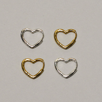 ENAMEL COPENHAGEN ORGANIC HEART SMALL HOOPS
