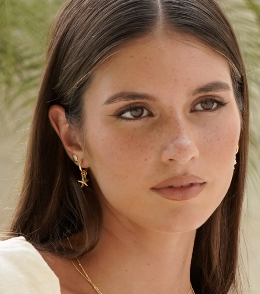 ESTELLA BARTLETT STARFISH CHARM HUGGIE HOOP EARRINGS