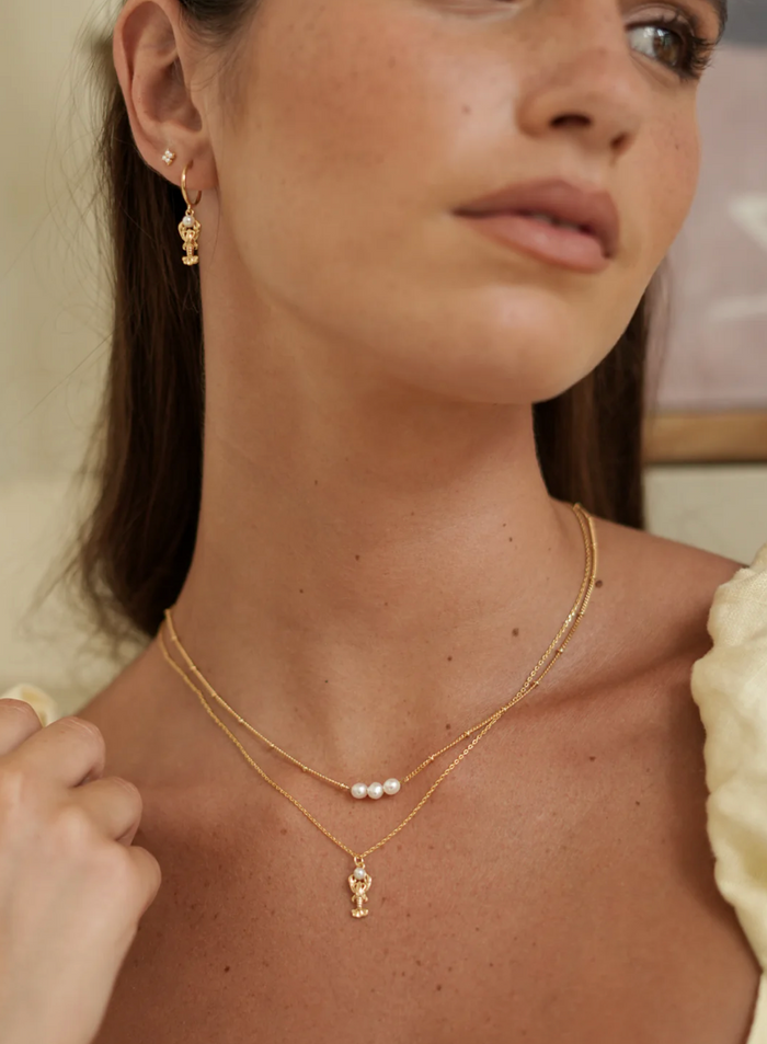 ESTELLA BARTLETT LOBSTER PEARL HOOP EARRINGS