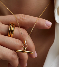 TILLY SVEAAS SMALL JEWELLED GOLD T BAR ON TRACE CHAIN