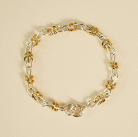 DAISY LONDON X POLLY NEWMAN MIXED METAL KNOT CHAIN BRACELET