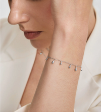 ANIA HAIE SILVER POLISHED TEARDROP DANGLE STATION BRACELET