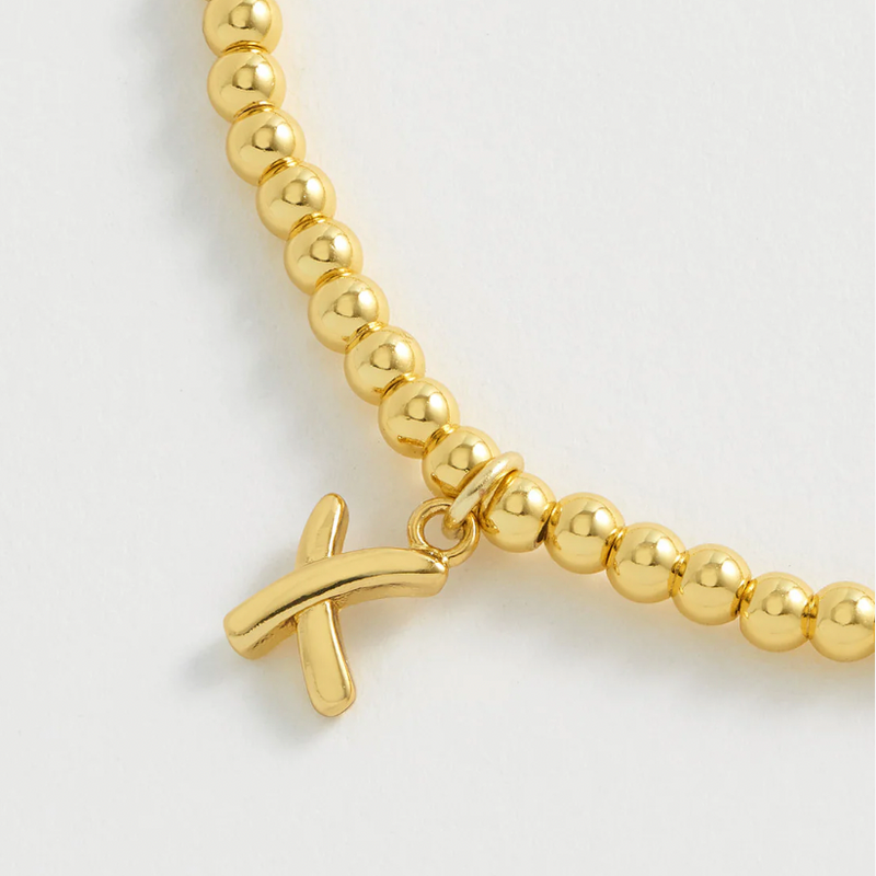 Estella Bartlett cross bracelet